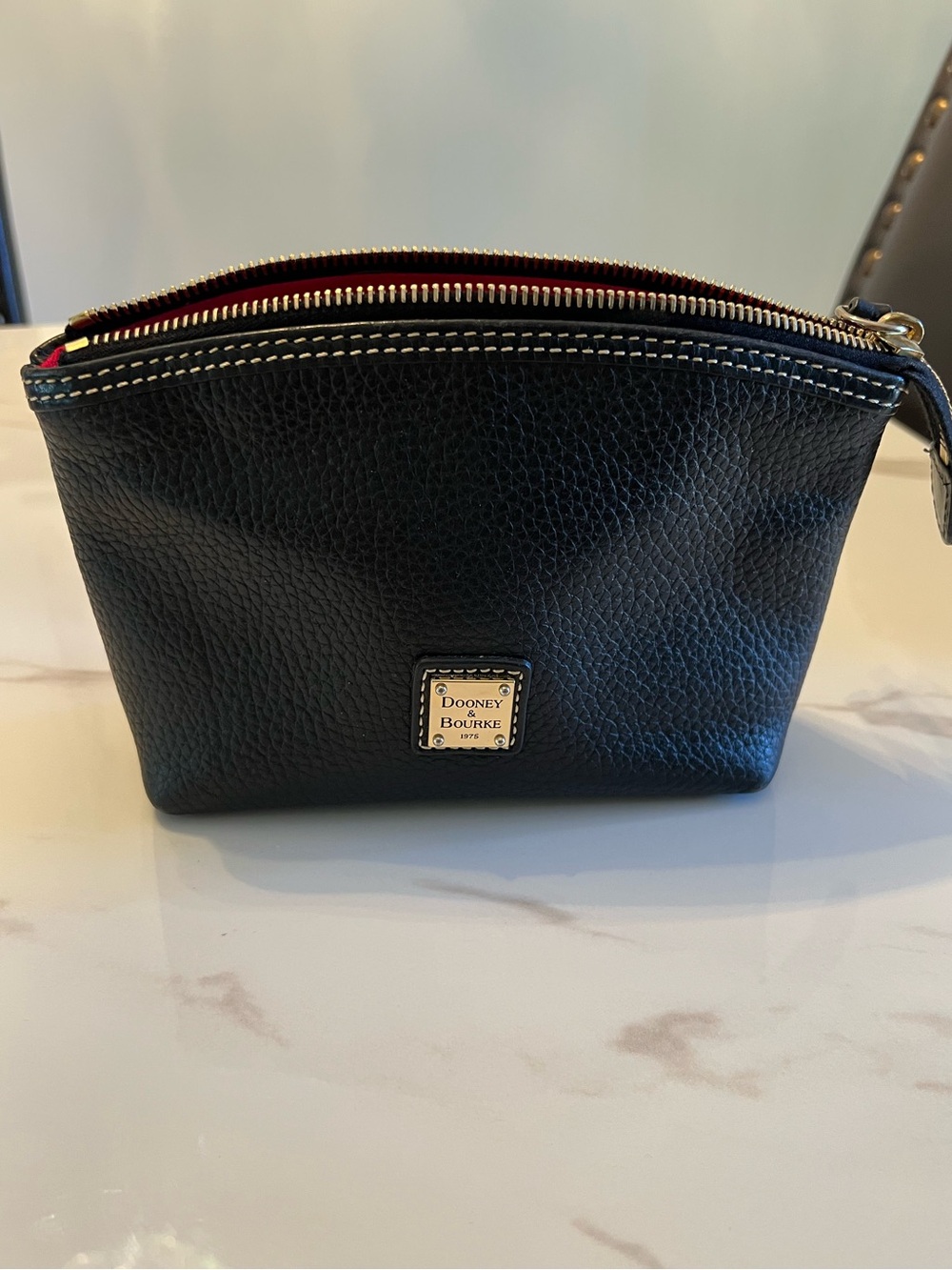 Dooney & Bourke Black Pebble Leather Zip Cosmetic Pouch with Red Lining